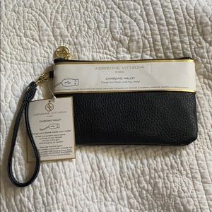 Phone charging wristlet. NWT